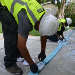 plumber preparing for trenchless pipe lining