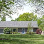 house with many trees around