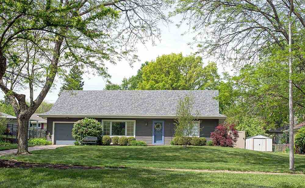 house with many trees around